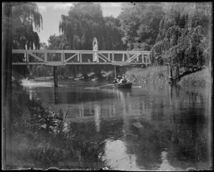 View of the Avon River with bridge and a boat