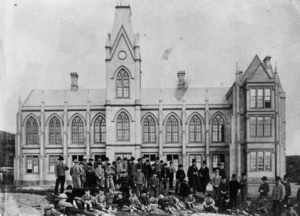 School children and teachers outside Wellington College