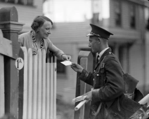Postman delivering a letter to a woman