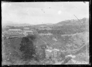 Houses on a bare gully and ridges