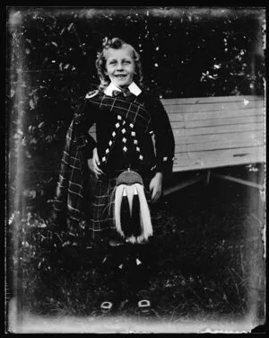 Boy wearing Scottish highland clothes