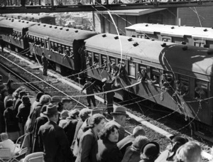 A train showing soldiers of the 3rd echelon departing to serve in World War II, Papakura, Auckland