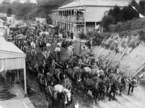 Procession of horses and carts transporting coal, Waikino