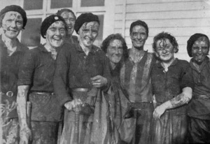 Wet and muddy women hockey players