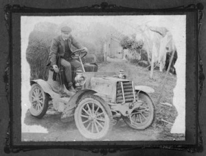 Man at wheel of Star automobile