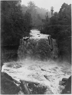 Creator unknown :Photograph of logs being transported by water, Mokoroa Falls Dam