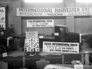 A display at the Olympia Motor Show, Wellington, advertising the ABC Motor Garage, International trucks, and spare parts