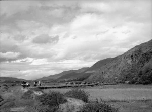Yunnan, China. Mule caravan on causeway one day from Lijiang. 18 September 1938.