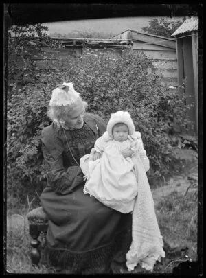 Sarah Jane Kirk holding a baby