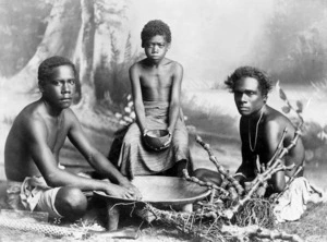 Fijian men around kava bowl