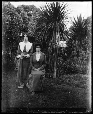 Portrait of two women in a garden setting