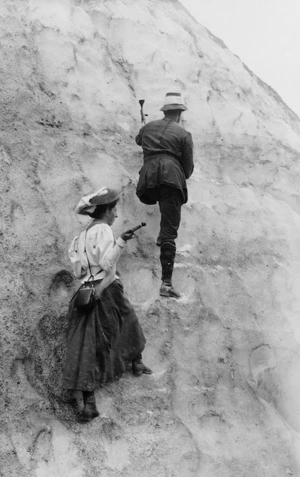 May Kinsey and an unidentified man climbing an ice face