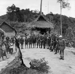 Patrol leaving camp on a 6 day trip to another Malay village, Malaya - Photograph taken by Peter Bush