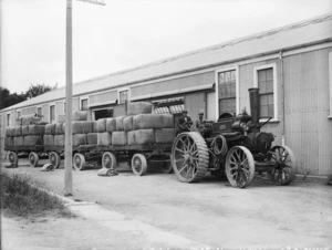 Wool bales hauled by a traction engine, alongside the Kaputone Wool Works, Belfast, Canterbury