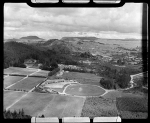 Te Kura o Te Whakarewarewa Primary School surrounded by fields and pine forest, Rotorua, Bay of Plenty