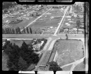 View of an unidentified suburb with vacant lots amongst residential housing, Rotorua City, Bay of Plenty Region