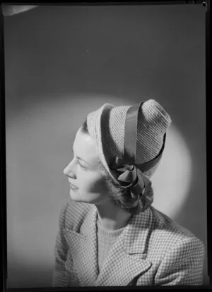 Mrs Vigor-Brown modelling knitted hat