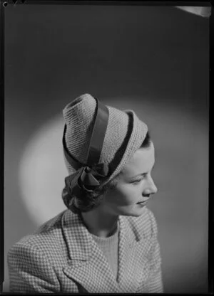Mrs Vigor-Brown modelling knitted hat