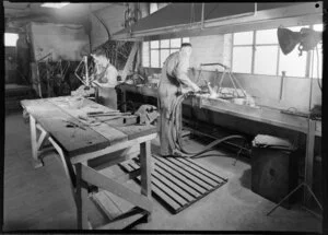 Factory workers working on frames