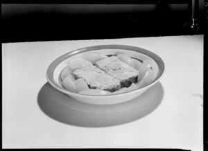 Bowl of Weetbix with tinned peaches