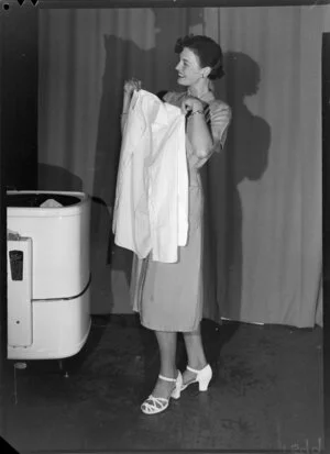 Model with Thor automatic washing machine, displaying clean shirt