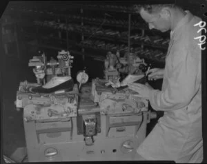 Man operating machine at Buchanan and Edwards shoe factory