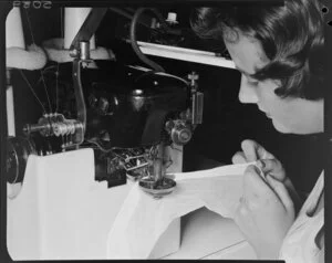 Woman sewing at Prestige Hosiery factory