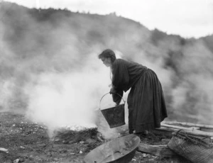 Unidentified Maori woman preparing food