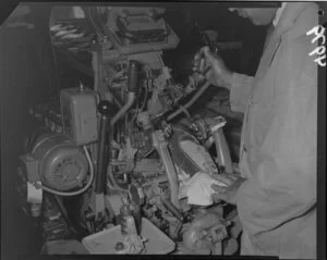 Man operating machine at Buchanan and Edwards shoe factory