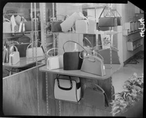 Handbags displayed on U-Rect-It shelving