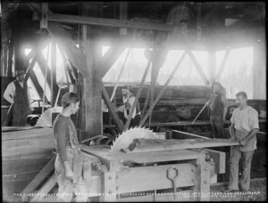 Workers inside a timber mill