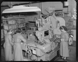 Women sorting tobacco leaves