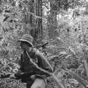 Company commander, Major A N King, on patrol in the Malayan jungle - Photograph taken by Peter Bush