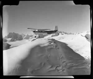 Mount Cook Air Services Cessna aircraft flying at the head of Franz Josef Glacier