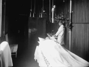 A man receiving theraputic treatment at the Government Sanatorium and Baths, Rotorua