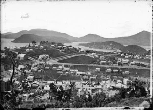 View of Port Chalmers looking towards Otago Harbour, with two churches visible centre left.
