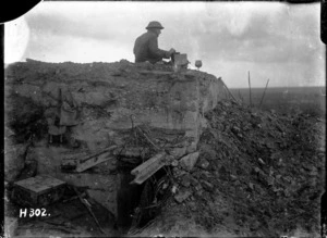 New Zealand World War 1 signaller on a German dug-out, in Belgium