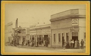 View of people and shops, Broadway, Reefton