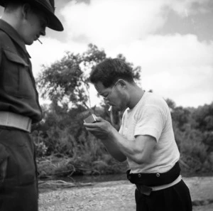 Japanese prisoner of war lighting his cigarette, Wairarapa
