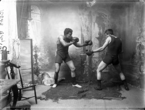 Posed portrait of two boxers in a fighting stance