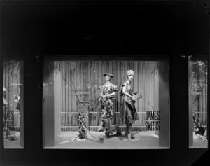 Dresses on display in window, James Smith Ltd., 1959