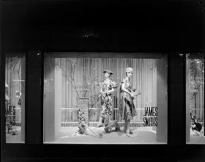 Dresses on display in window, James Smith Ltd., 1959