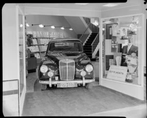 Car parked in entrance of Vance Vivian store, Lower Hutt