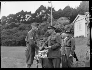 Corporal C A Beyer receiving the Berry Cup, Wellington College