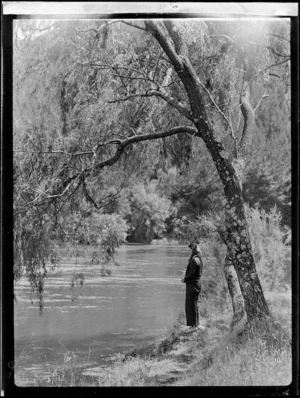 Zeila Wells beside Waikato River, Atiamuri