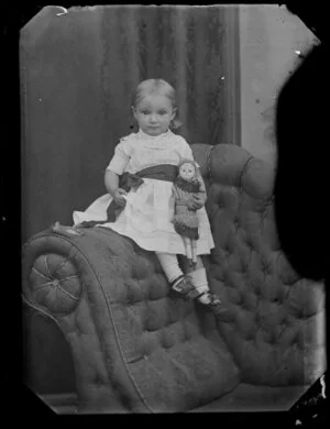 Unidentified girl with doll