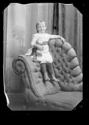 Unidentified girl with doll