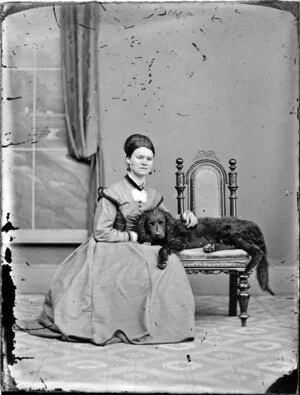 Unidentified woman with dog