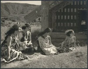 Maori women outside meeting house