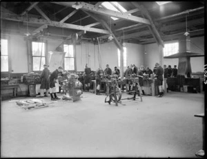 Mechanical engineering workshop with school boys, probably in the Nelson district